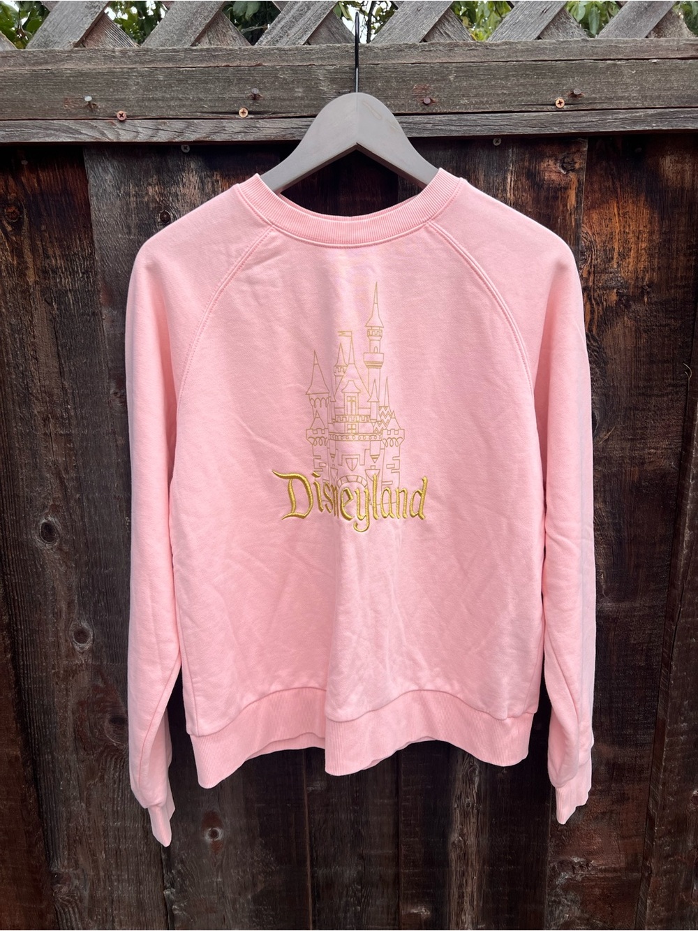 Disney Pink Crewneck Sweatshirt with Gold Castle Logo